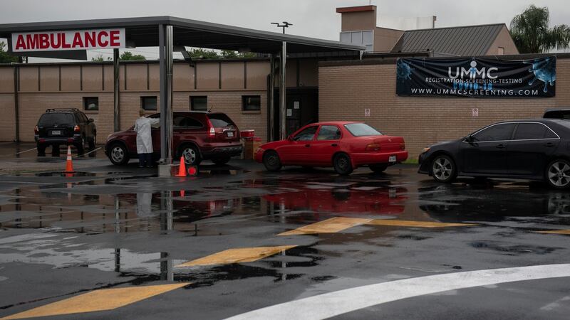 People in cars at a drive-thru testing site for coronavirus, at United Memorial Medical Center in Houston. Photograph: Callaghan O’Hare/The New York Times