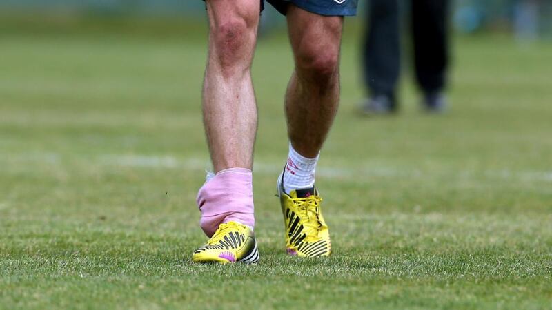 The Stoke City striker left the field with his right ankle heavily strapped. Photograph: Donall Farmer/Inpho