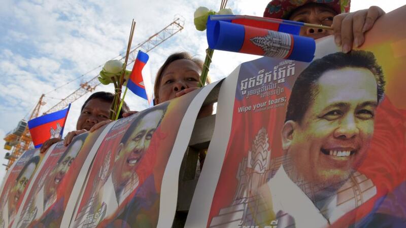 Cambodian media: a funeral procession for Kem Ley, a political commentator shot dead in July 2016. Photograph: Tang Chhin Sothy/AFP/Getty