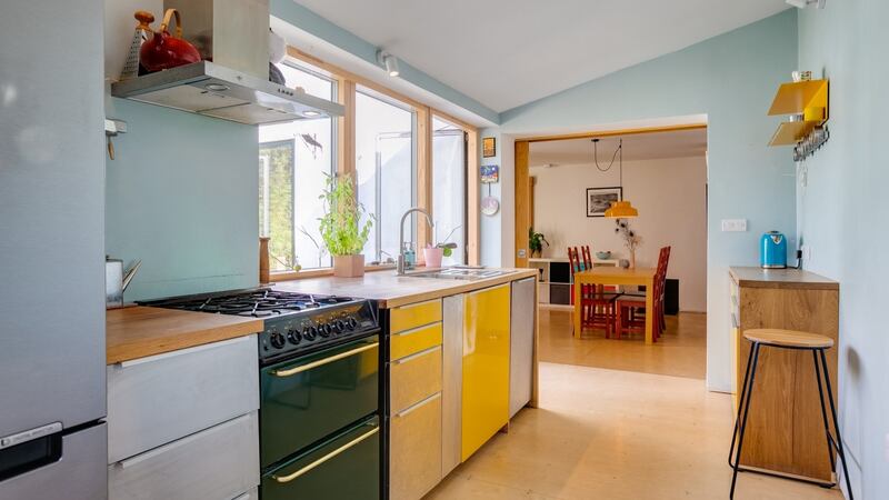 The broken plan living room and kitchen.