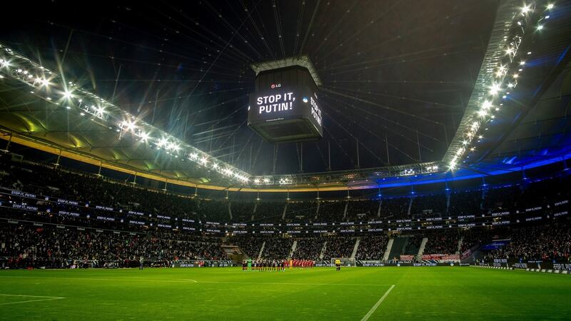 Teams observe a minute’s silence  in support of Ukraine prior to a German Bundesliga match between Eintracht Frankfurt and Bayern Munich in Frankfurt on Saturday. Photograph: Michael Probst/AP