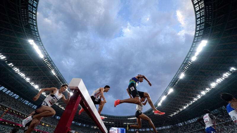 Athletes compete during an Olympic test event, part of the World Athletics Continental Tour, at the National Stadium in Tokyo. Photograph: Toru Hanai/Getty Images
