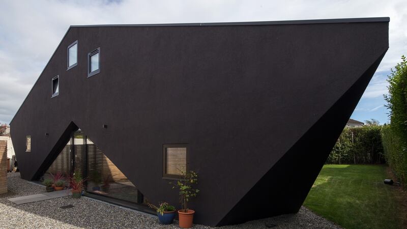 The house is not painted, rather, the render is self-coloured