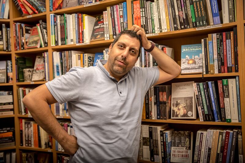 Mahmoud Muna in one of his family's bookshops in East Jerusalem. Photograph: Sally Hayden