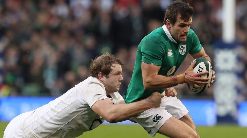 Jared Payne: the New Zealand native, who won 21 caps for Ireland, in action  against  England’s Joe Launchbury in 2017. Photograph: Billy Stickland/Inpho
