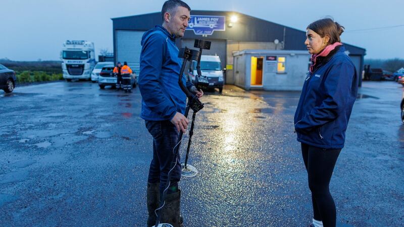 Sean Rowlette and his daughter arrive with metal detectors to assist gardaí in the search. Photograph: James Connolly
