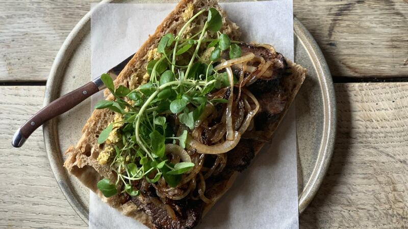 Venison steak sandwiched with sticky onions and Cashel Blue butter