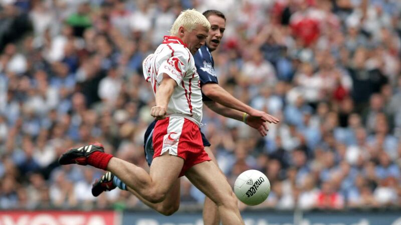 Tyrone’s Owen Mulligan shoots to score a goal against Dublin in the All-Ireland football championship quarter-final in 2005. Photograph:  Tom Honan/Inpho