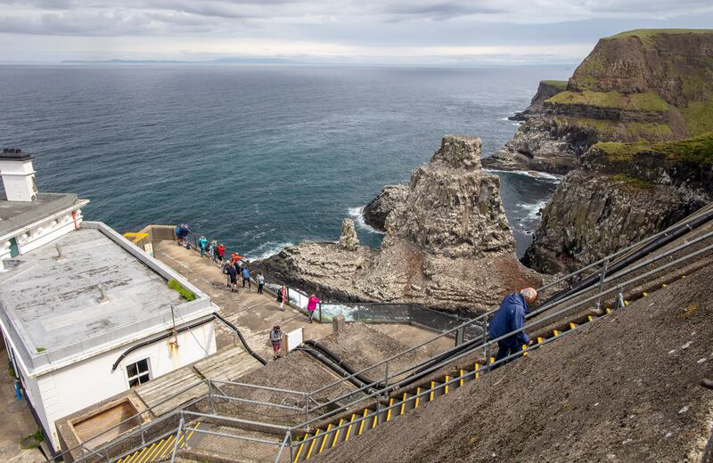 People arrive at the RSPB bird centre, on Rathlin Island. Photograph: Paul Faith