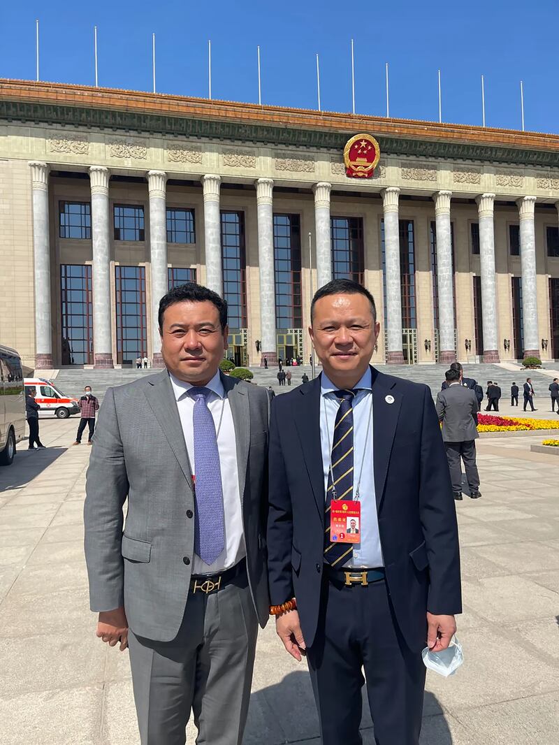 Dr Yupeng Liu (left) and Huade (Perry) Chen outside the Great Hall of the People in Beijing in May 2023