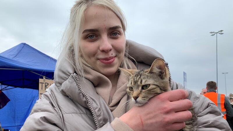 Alina Krasnochub from Kyiv burst into tears when she descended from the bus at the Polish border. She brought her pet cat Judy on the long journey. Photograph: Lara Marlowe