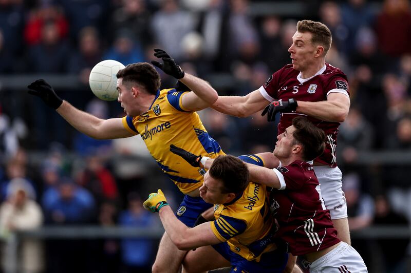 Roscommon's Cian Connolly and Niall Daly compete in the air with Dylan McHugh and Cathal Sweeney of Galway during the league. Photograph: Ben Brady/Inpho