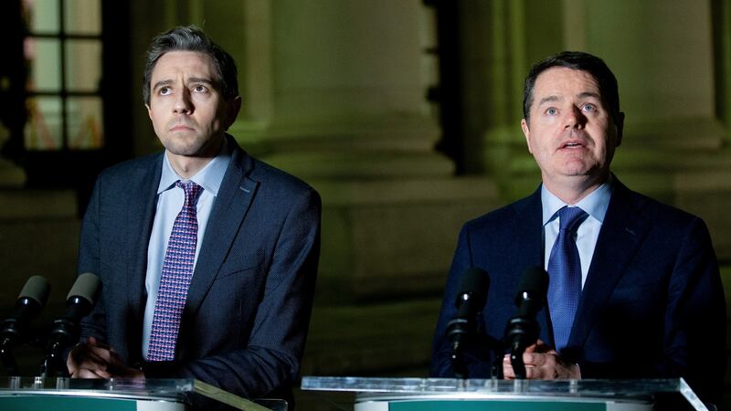 Minister for Health Simon Harris and Minister for Finance  Paschal Donohoe  outside Government Buildings on Monday night. Photograph: Tom Honan