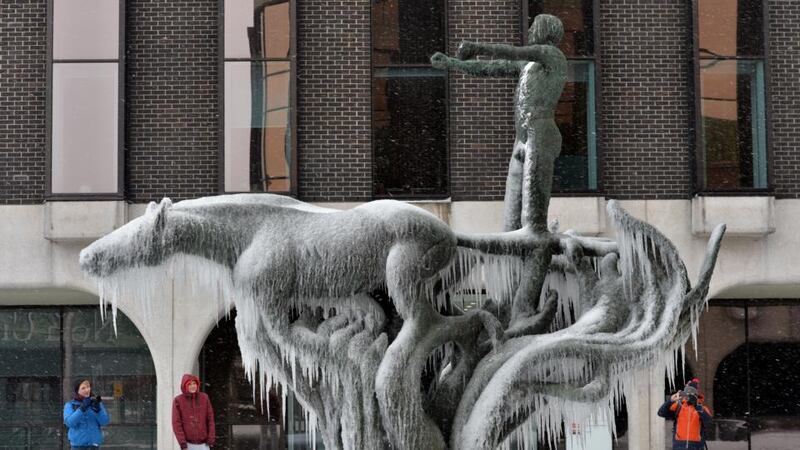 The sculpture fountain at the Irish Life building in Dublin iced over. Photograph: Alan Betson