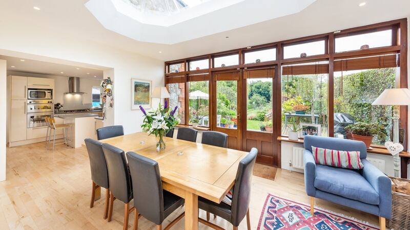 Living-dining-kitchen, an extension added in 1996 that is bright and airy thanks to lantern rooflight overhead