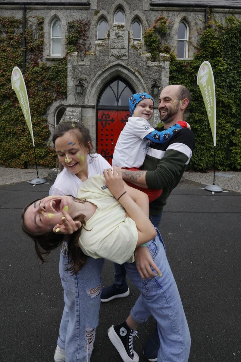 Ashley and Dean Keenan with their children Madi (12) and Isaac (6) having fun at Barretstown. Photograph: Alan Betson