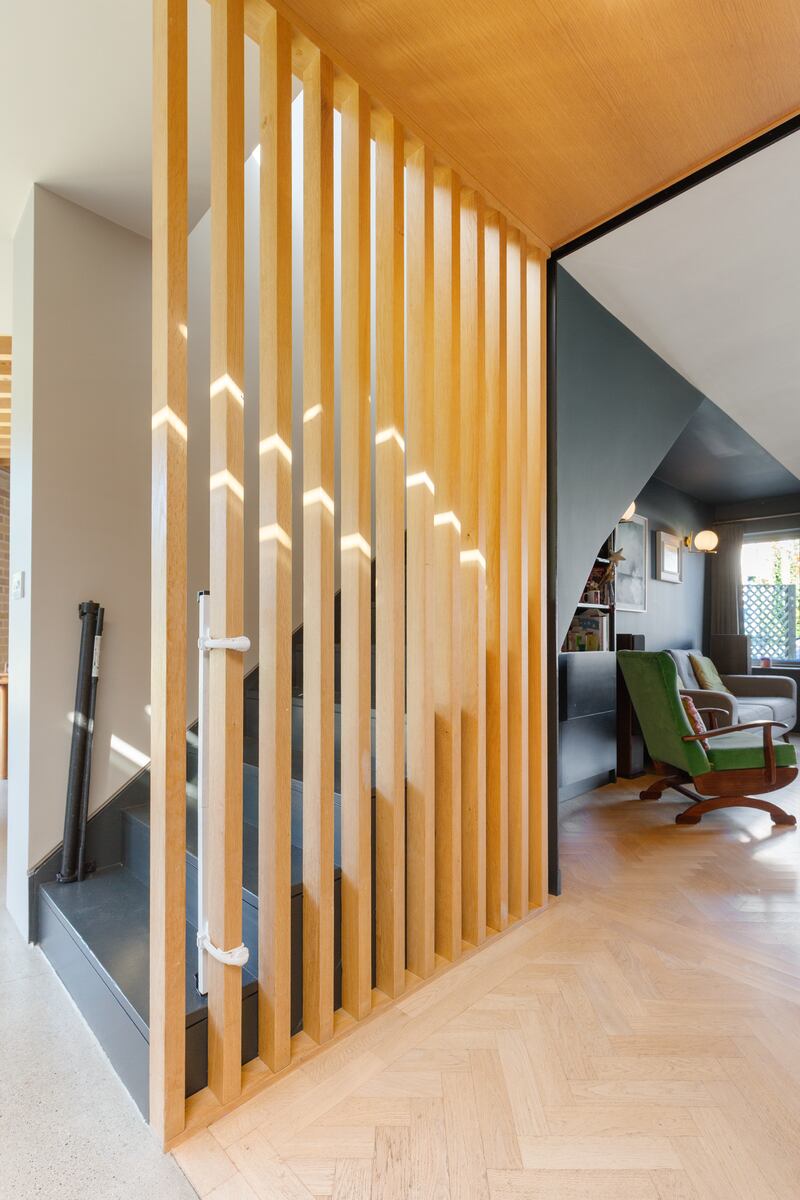 The use of wooden slats in the design adds texture and interest