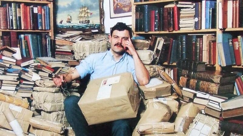 Conor Kenny surrounded by book parcels in the Galway bookshop in 1988