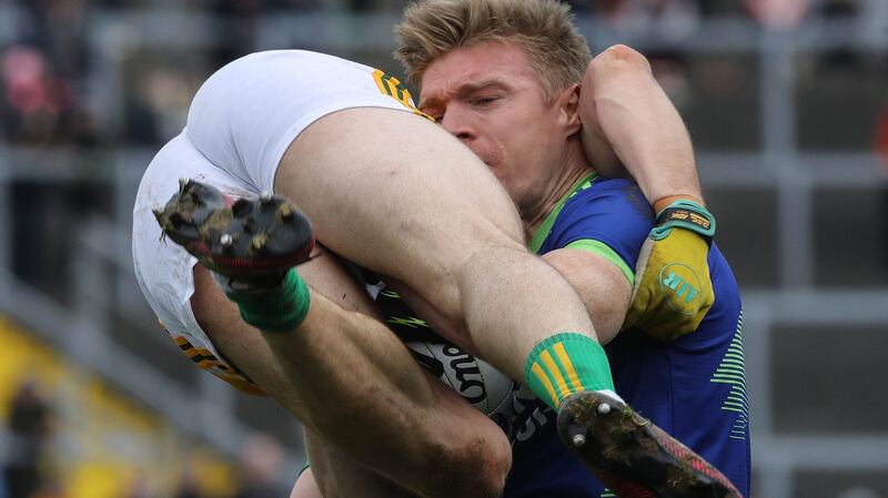 Kerry’s Tommy Walsh tangles with Conor McGill of Meath. Photograph: Lorraine O’Sullivan/Inpho