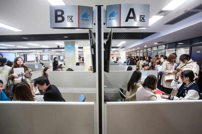 Job-seekers look for employment opportunities at a job fair for arts workers in Nanjing city in east China's Jiangsu province. Photograph: Zhong Nan/Feature China/Future Publishing via Getty