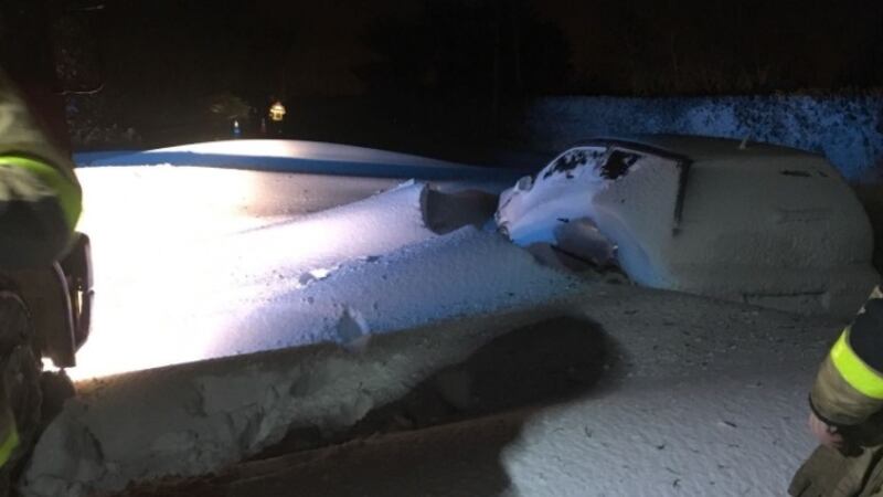 Skerries firefighters at cars abandoned on the Lusk Road early on Friday morning. Photograph: Dublin Fire Brigade/Twitter