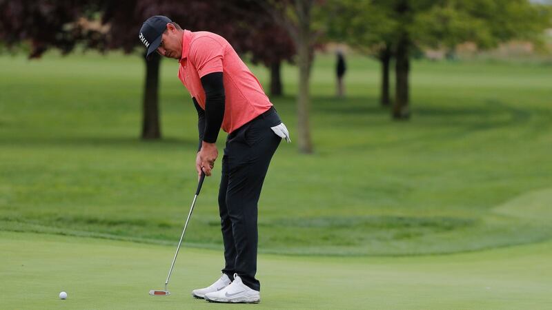 Brooks Koepka putts on the first green during a practice round. Photo: Julie Jacobson/AP Photo