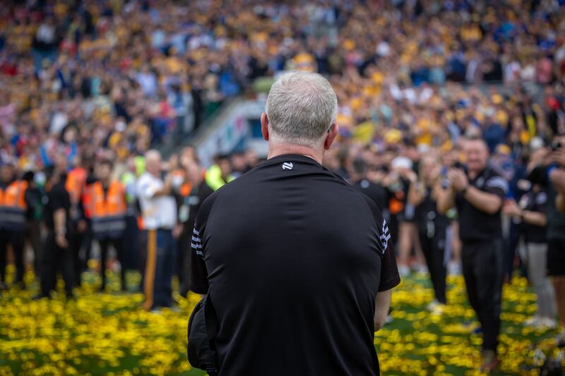 Clare manager Brian Lohan watches his team receive the Liam McCarthy cup after the Senior All-Ireland Hurling Championship final, Croke Park, in July. Photograph: Morgan Treacy/Inpho