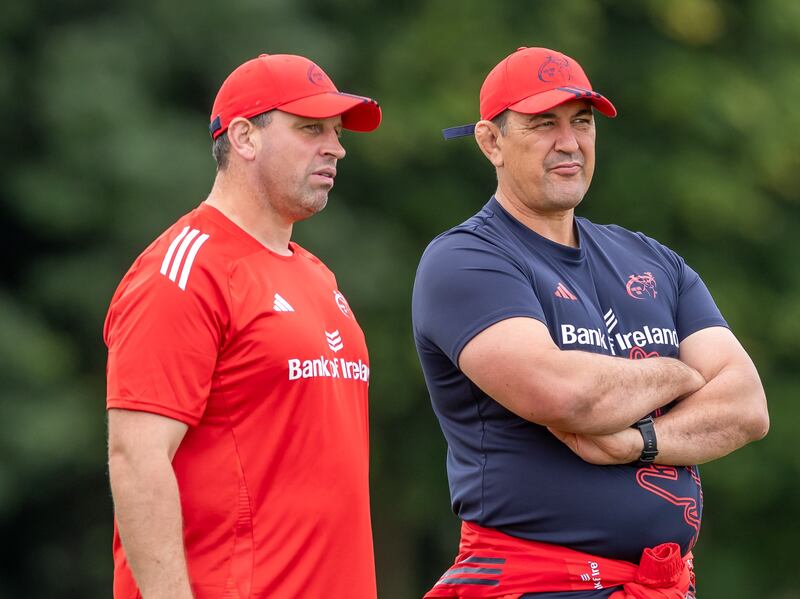 Munster defence coach Denis Leamy and head coach Clayton McMillan. Photograph: Morgan Treacy/Inpho