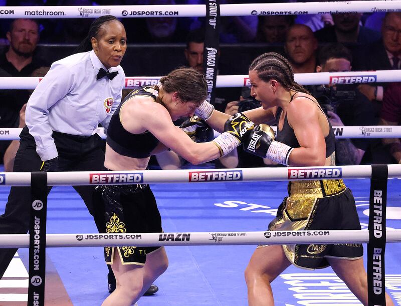 Katie Taylor (left) and Chantelle Cameron during their Super-Lightweight World Title bout at the 3Arena in Dublin on Saturday. Photograph: Damien Eagers/PA Wire