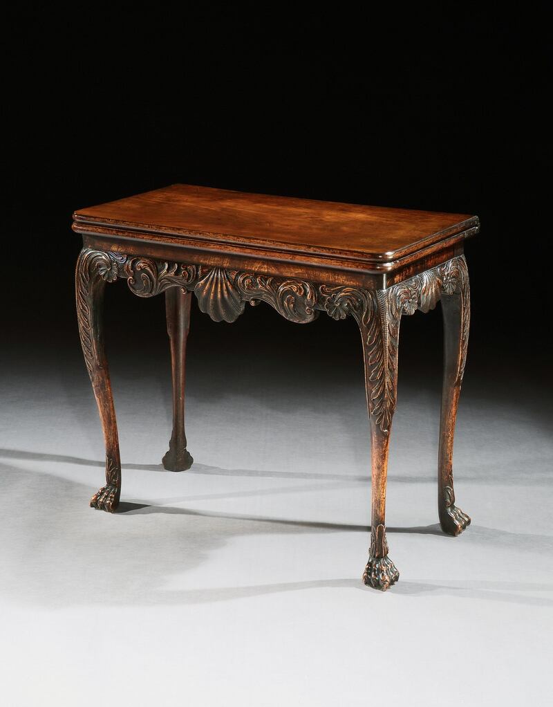 Side table with intricate frieze, which had been on loan to Malahide Castle.
