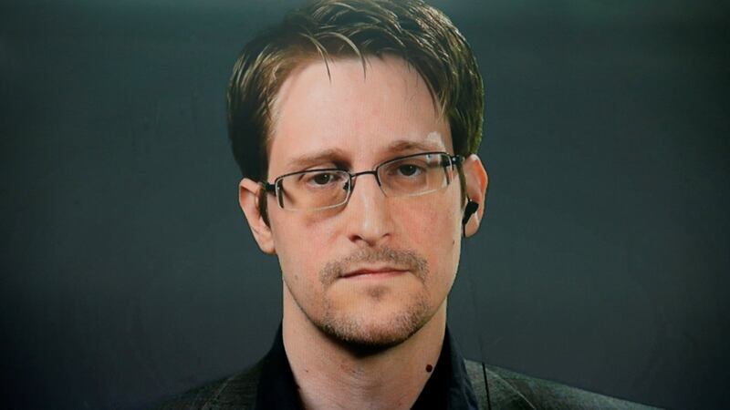 Edward Snowden speaking via video link during a news conference in New York City last week. The Washington Post said he should show himself “willing to go to jail for [his] beliefs”. Photograph: Brendan McDermid/Reuters