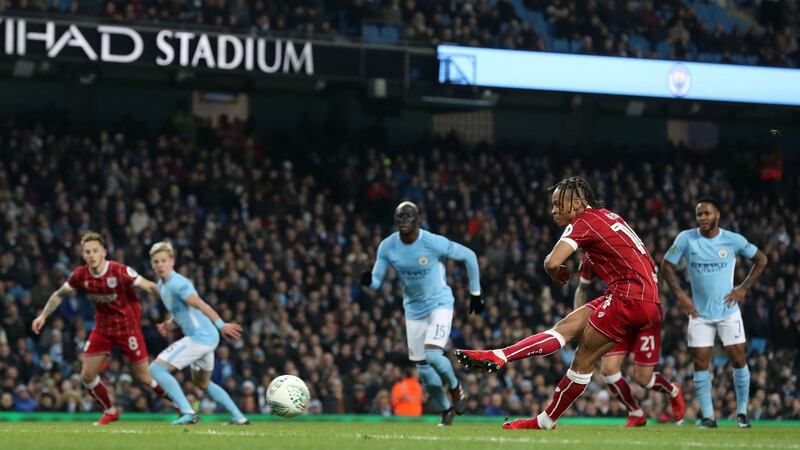 Bristol City’s Bobby Reid scores his side’s first goal of the game from the penalty spot during the Carabao Cup semi- final first leg match against Manchester City   at the Etihad Stadium. Photograph:   Martin Rickett/PA Wire