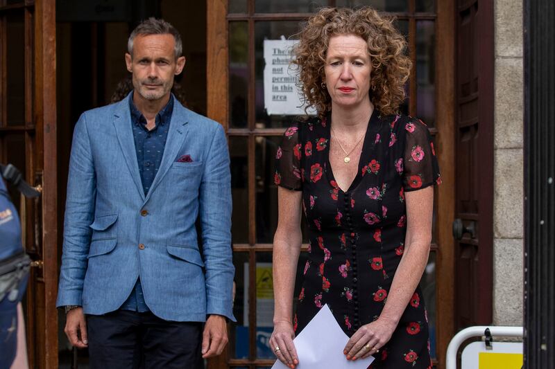 Meabh and Sebastien Quoirin, parents of Nora Quoirin who went missing and died in Malaysia, in August 2019, leaving the Four Courts in Dublin on Wednesday, where they read a statement to media announcing the settling of their case. Photograph: Collins Courts