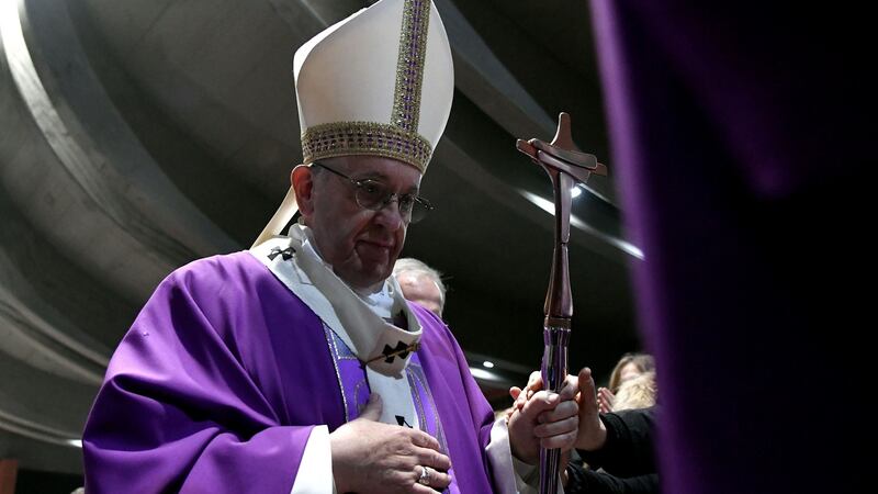 Pope Francis leaves at end of the pastoral visit in the parish of San Gelasio in the Ponte Mammolo neighborhood on the outskirts of Rome. Photograph: Tiziana Fabi/AFP/Getty Images