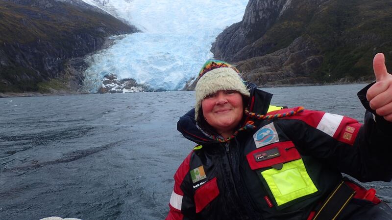 Moore at a glacier in Italy for a two kilometre swim in three degree water. Photo: Nuala Moore