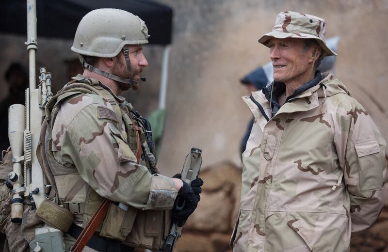 American Sniper: Bradley Cooper with Clint Eastwood, the movie’s director, during filming. Photograph: Keith Bernstein/Warner Bros