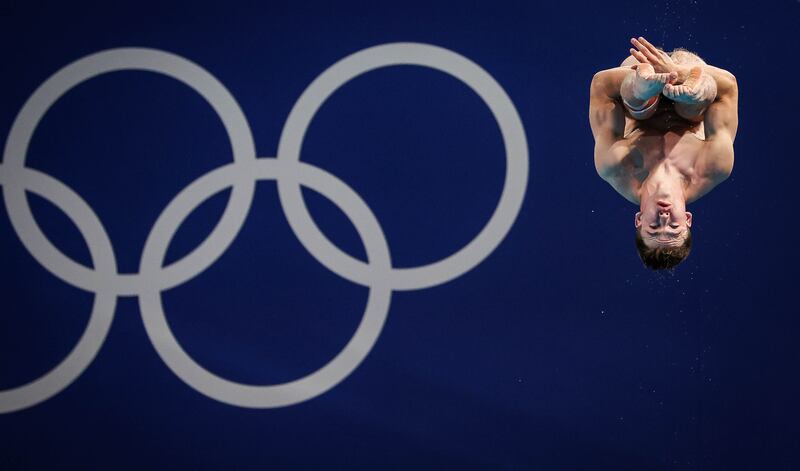 Ireland’s Jake Passmore dives during the 3m springboard qualifying at the Aquatics Centre in Paris. Photograph: Ryan Byrne/Inpho