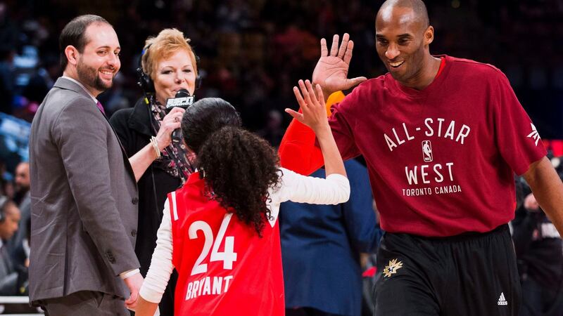 Kobe Bryant high-fives his daughter Gianna during warm-up for the NBA All-Star Game in Toronto in 2016. Photograph: Mark Blinch/AP