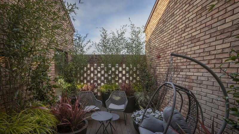 First-floor terrace of three-bed homes.