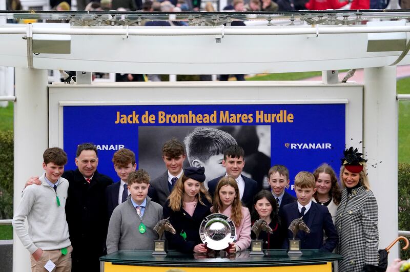 Henry de Bromhead, Mia de Bromhead, Georgia de Bromhead, Heather de Bromhead and friends during a presentation to the winning connections after You Wear It Well won the Jack de Bromhead Mares Novices Hurdle at Cheltenham. Photograph: PA Wire 