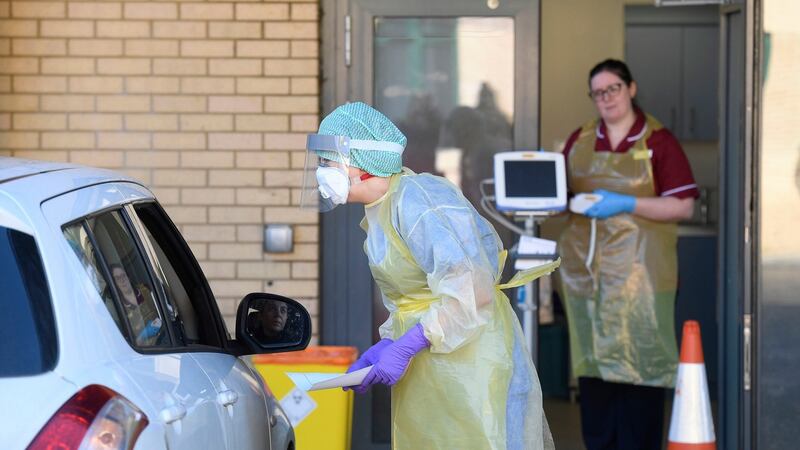 An emergency department nurse during a demonstration of the coronavirus pod and Covid-19 virus testing procedures set-up beside the Emergency Department of Antrim Area Hospital, Co Antrim. Photograph: Michael Cooper/PA Wire