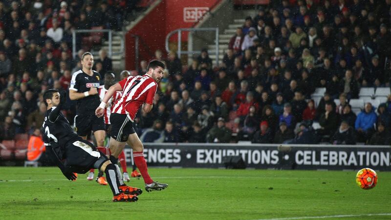 Shane Long of Southampton scores his team’s first goal during the  Premier League match against Watford at St Mary’s Stadium. Photograph: Ian Walton/Getty Images