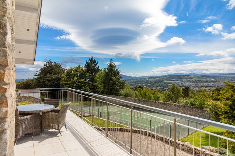 View from balcony over Dublin mountains and tennis court