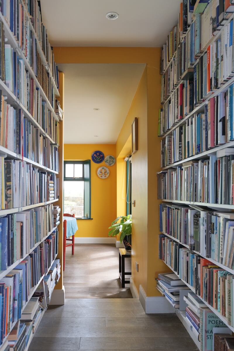 Book-lined corridors serve as a reminder of the house's literary alumni