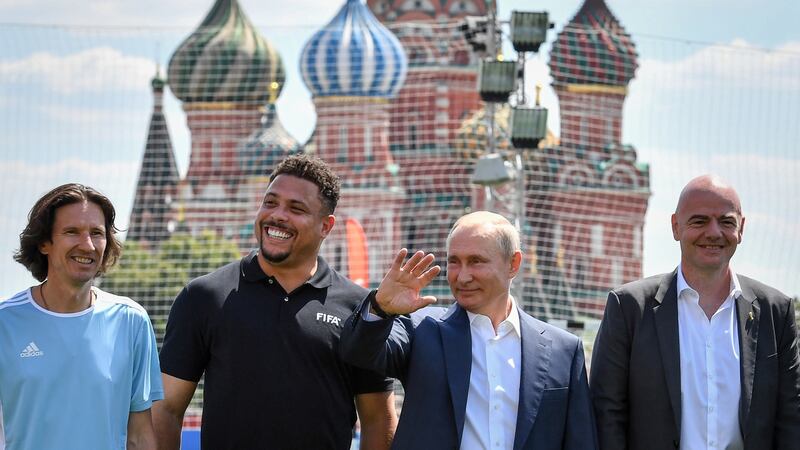 Fifa president Gianni Infantino with former Brazil striker Ronaldo, Russia’s anti-racism inspector and Vladimir Putin. Photograph: Getty Images