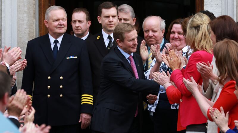 Taoiseach Enda Kenny is congratulated by well-wishers outside the Dáil before leaving for the Phoenix Park. Photograph: Nick Bradshaw
