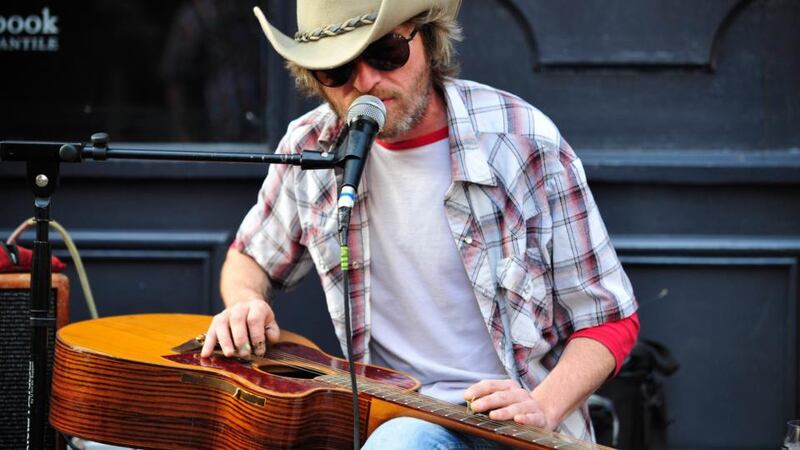 NVC Lawlor pictured playing in Dame Lane, Dublin, as part of Stetson and The City music trail taking place in Dublin this weekend. Photograph: Aidan Crawley