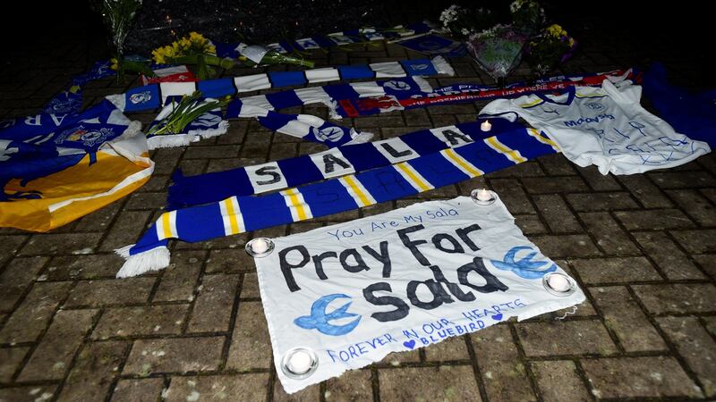 Tributes left outside the Cardiff City Stadium for Emiliano Sala. Photo: Rebecca Naden/Reuters