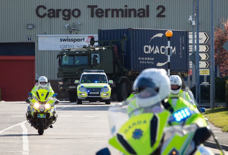 Army Vehicles pictured leaving Dublin on March 29th following the arrival of a consignment of PPE. Photograph: Tom Honan/The Irish Times Boxes of PPE are unloaded at Dublin Airport on March 29th. Photograph: Tom HonanThe Irish Times