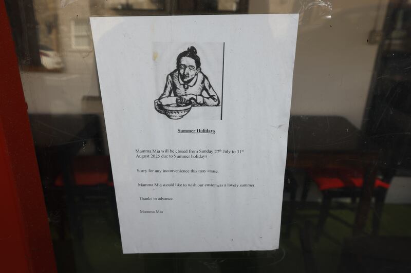 A notice on the door of Mamma Mia restaurant, Grattan Street, Dublin.  Photograph Nick Bradshaw